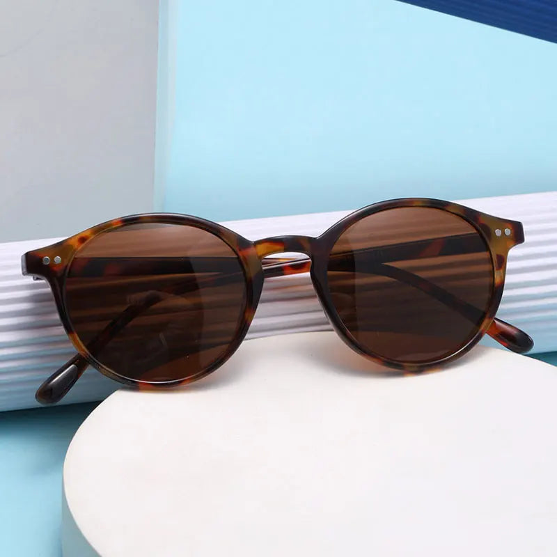 Lentes de sol redondos polarizados UV400 estilo retro